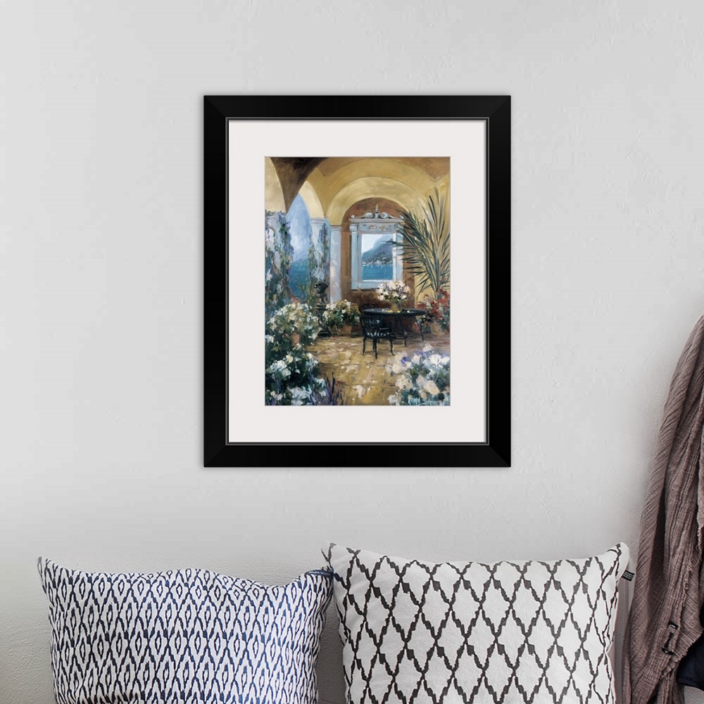 A bohemian room featuring Fine art oil painting landscape of an Italian courtyard terrace with flowering plants and a table...