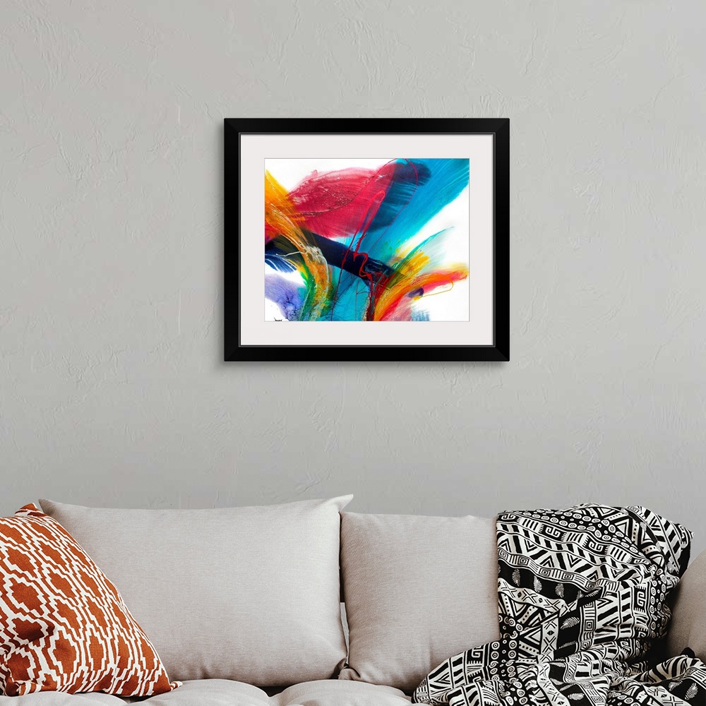 A bohemian room featuring An abstract painting on a square canvas this artwork has a great sense of energy and motion.