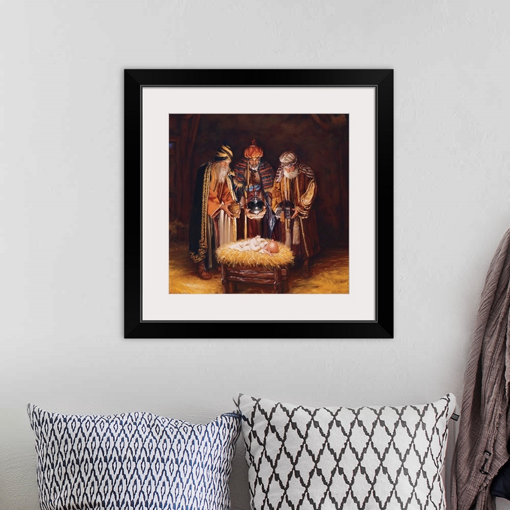 A bohemian room featuring Religious art of three wise men bringing baby Jesus gifts.