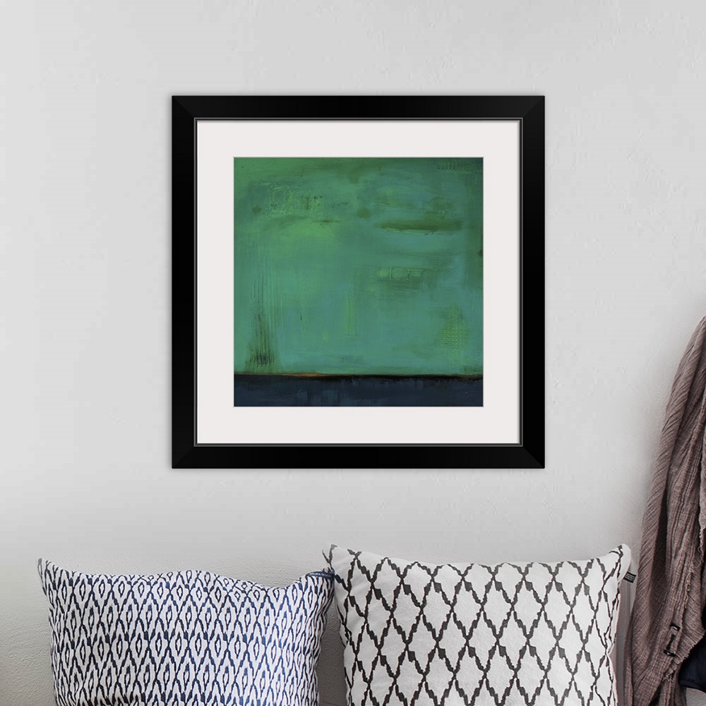A bohemian room featuring Square, abstract painting featuring large blocks of color in green and dark blue/gray