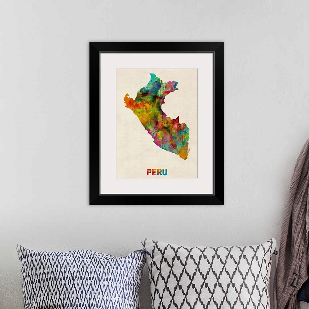 A bohemian room featuring Contemporary piece of artwork of a map of Peru made up of watercolor splashes.