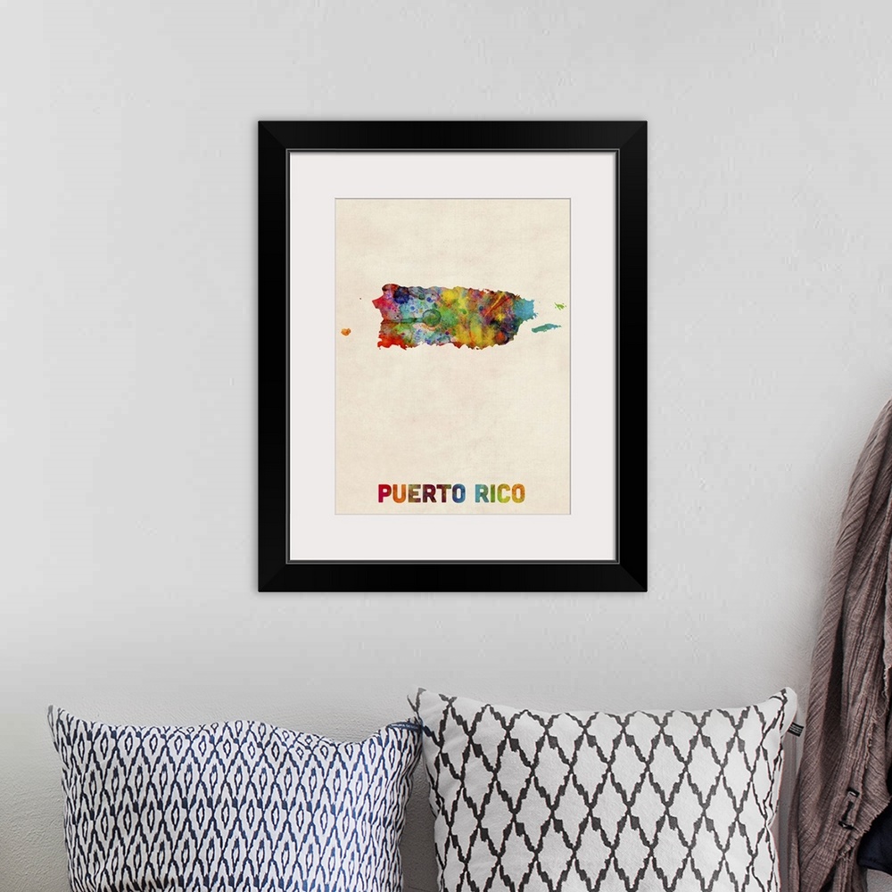 A bohemian room featuring Colorful watercolor art map of Puerto Rico against a distressed background.