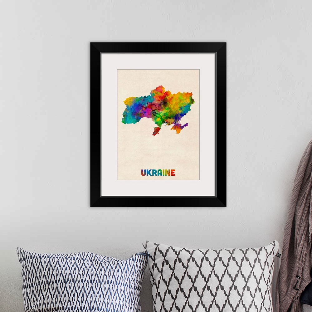 A bohemian room featuring Colorful watercolor art map of Ukraine against a distressed background.