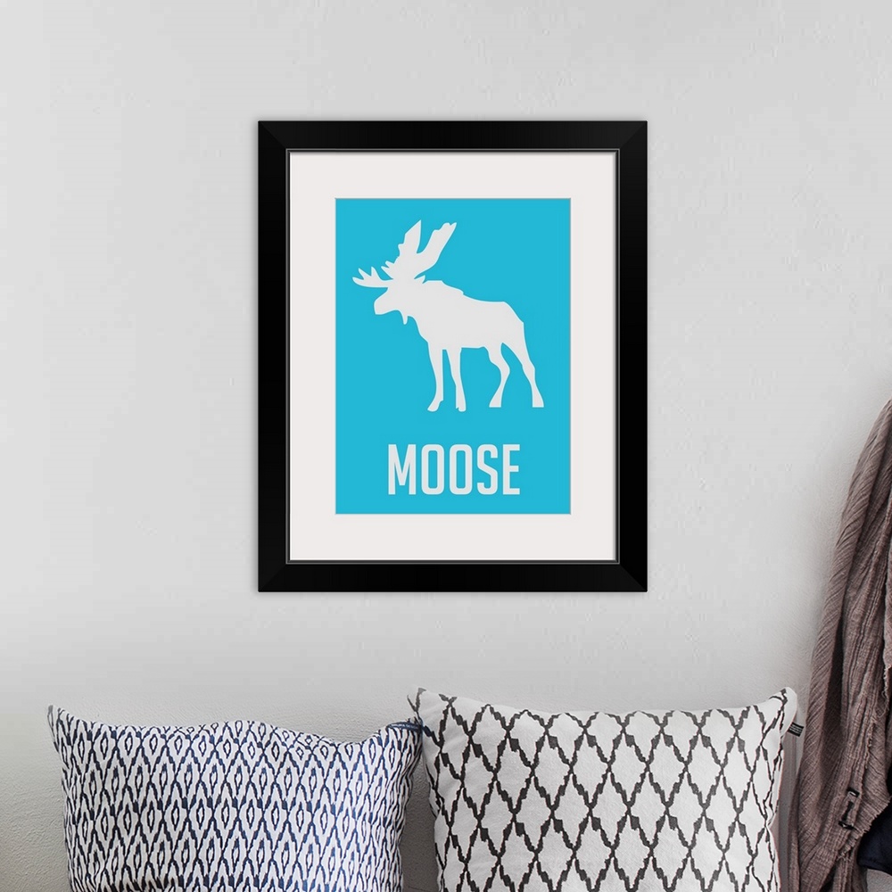 A bohemian room featuring Minimalist Wildlife Poster - Moose - Blue