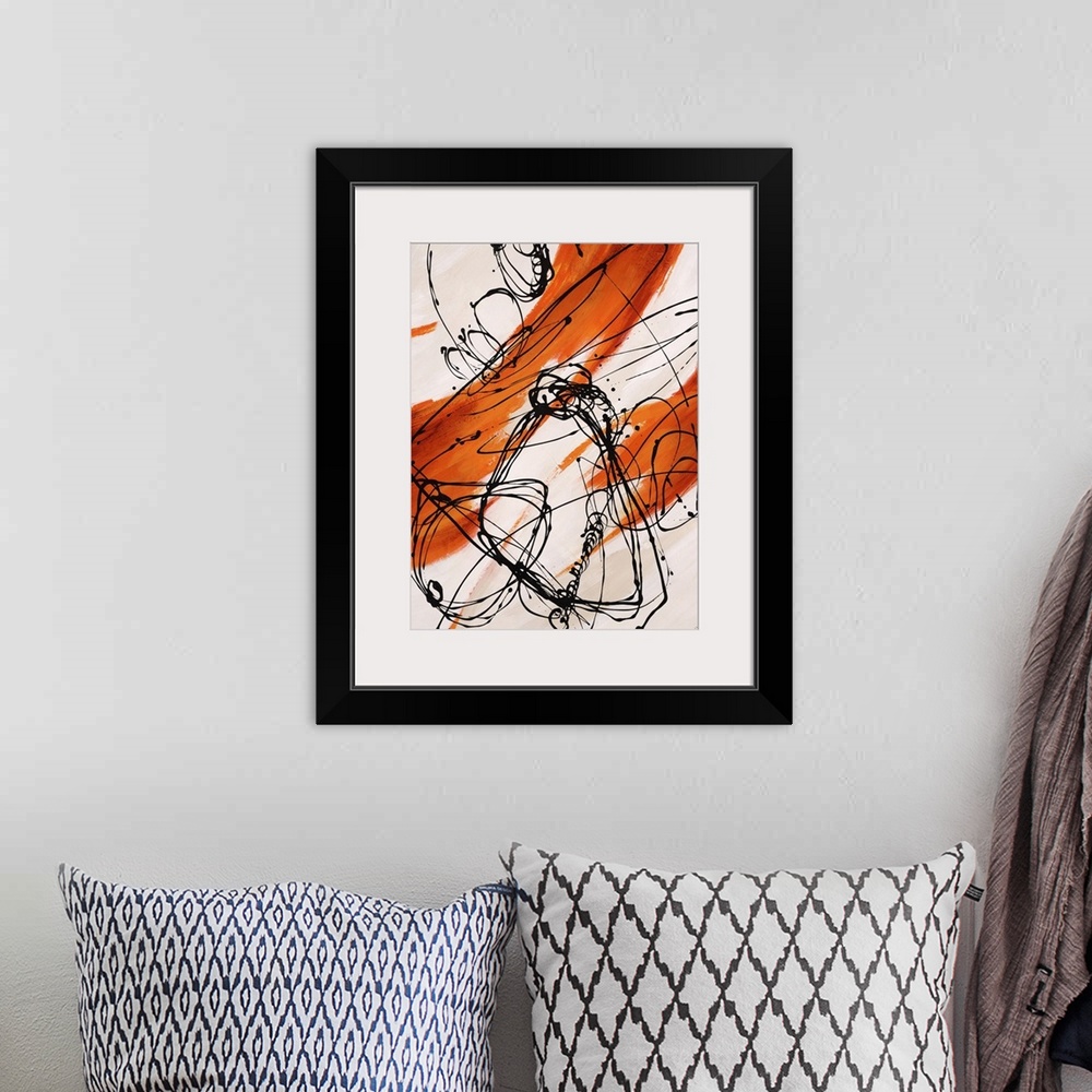 A bohemian room featuring Abstract painting, with bright orange paint swipes and dark black thin line splatters.