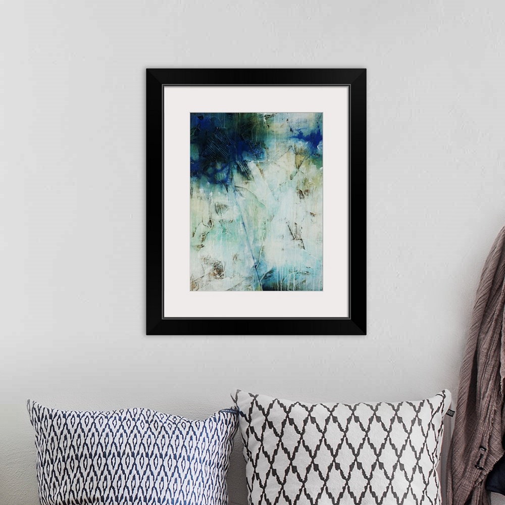 A bohemian room featuring Abstract art of a large mass of cool colors at the top, with a single line of blue that leads dow...