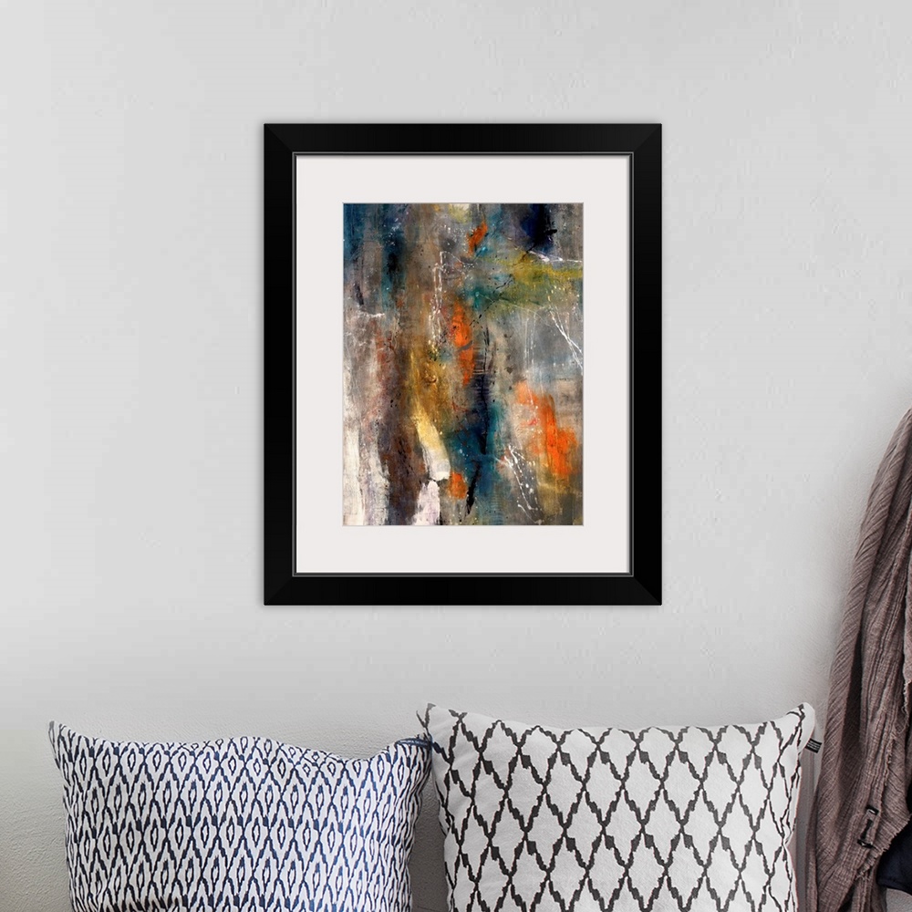 A bohemian room featuring Large abstract art uses a background mixture of dark tones with brief highlights of warm and ligh...