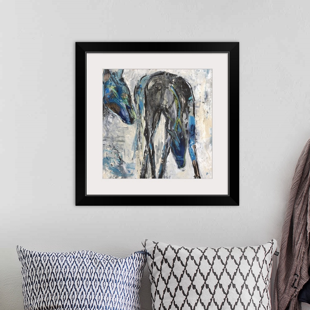 A bohemian room featuring Contemporary painting of two horses in shades of blue and black.