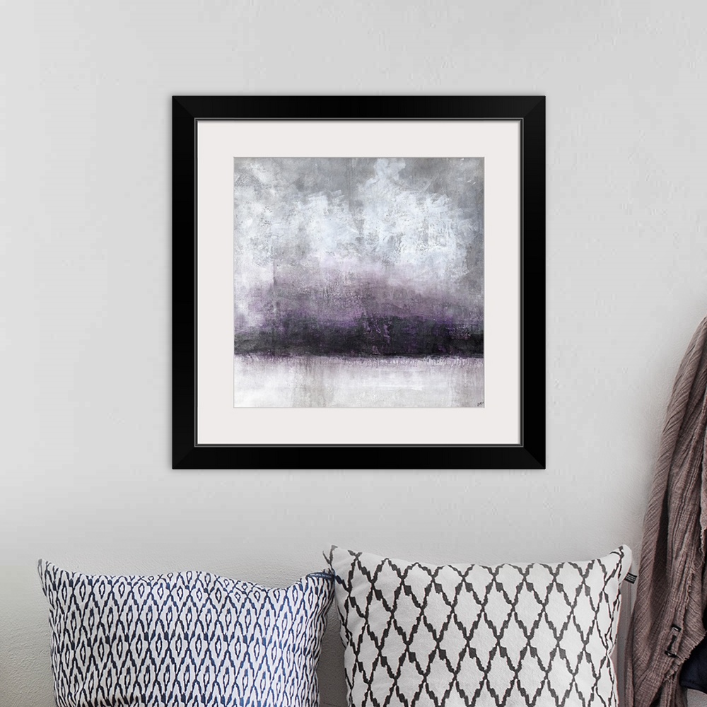 A bohemian room featuring A moody abstract landscape in shades of gray and purple.