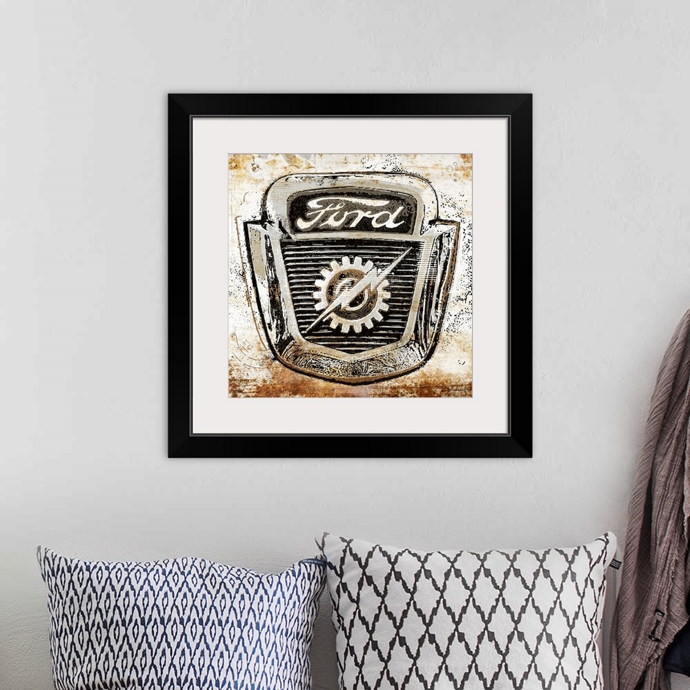 A bohemian room featuring A worn, distressed, cracked and rusty Ford emblem sign on a white background.