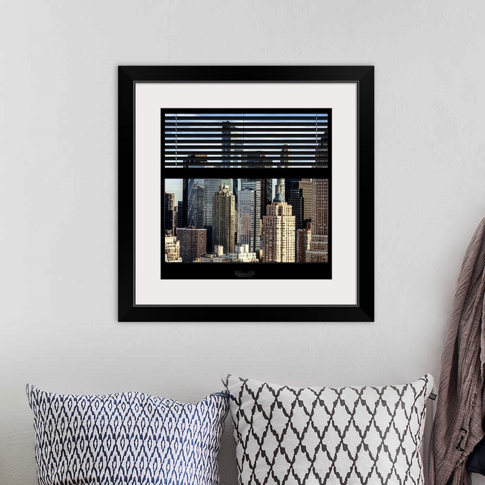 A bohemian room featuring Artistic photograph New York city as if viewed from a window.