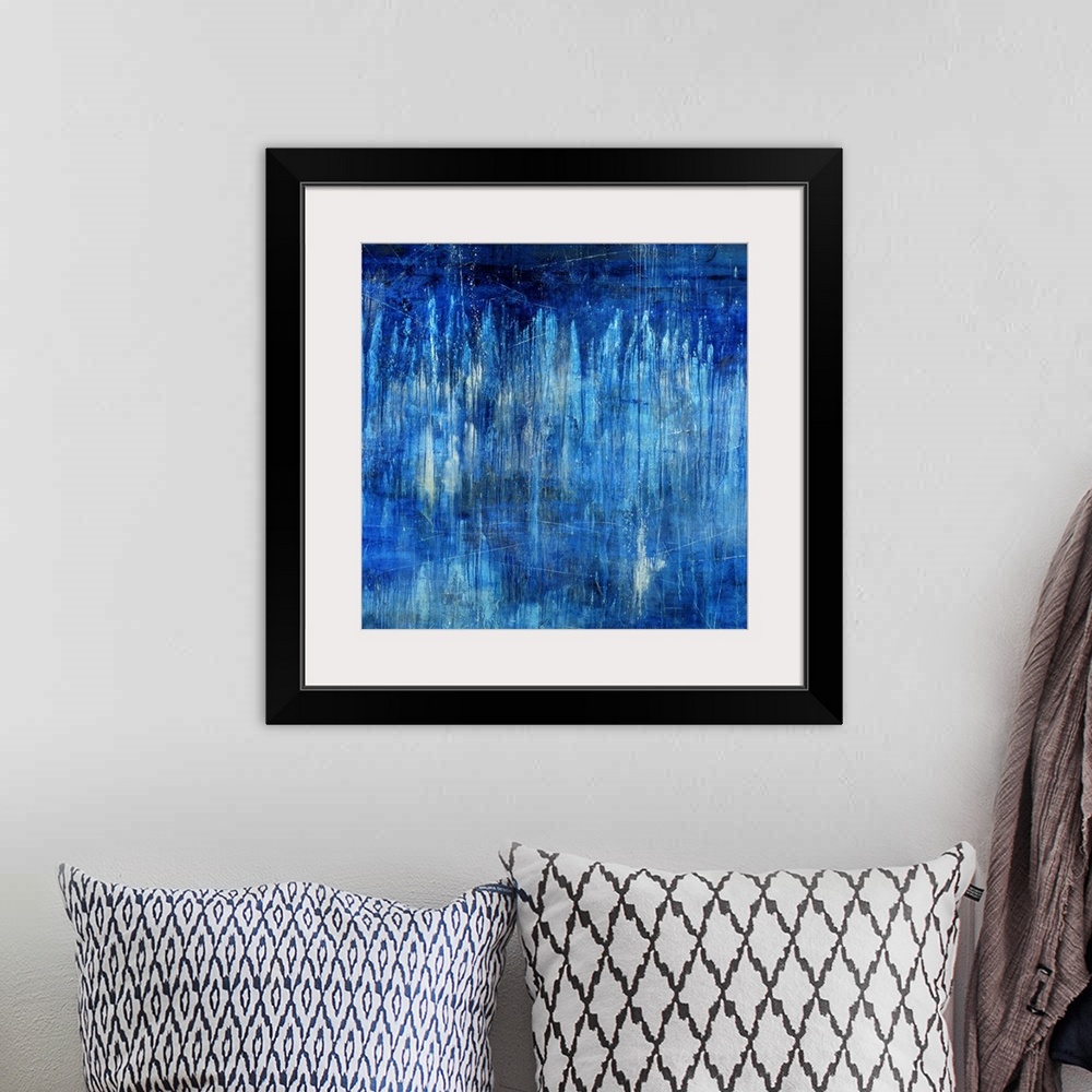 A bohemian room featuring Big, landscape, abstract painting in blue tones of light vertical streaks in transitioning blue t...