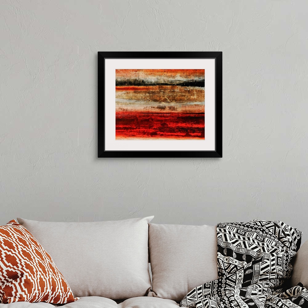 A bohemian room featuring Abstract artwork painted with rich scarlet red and rich brown tones.