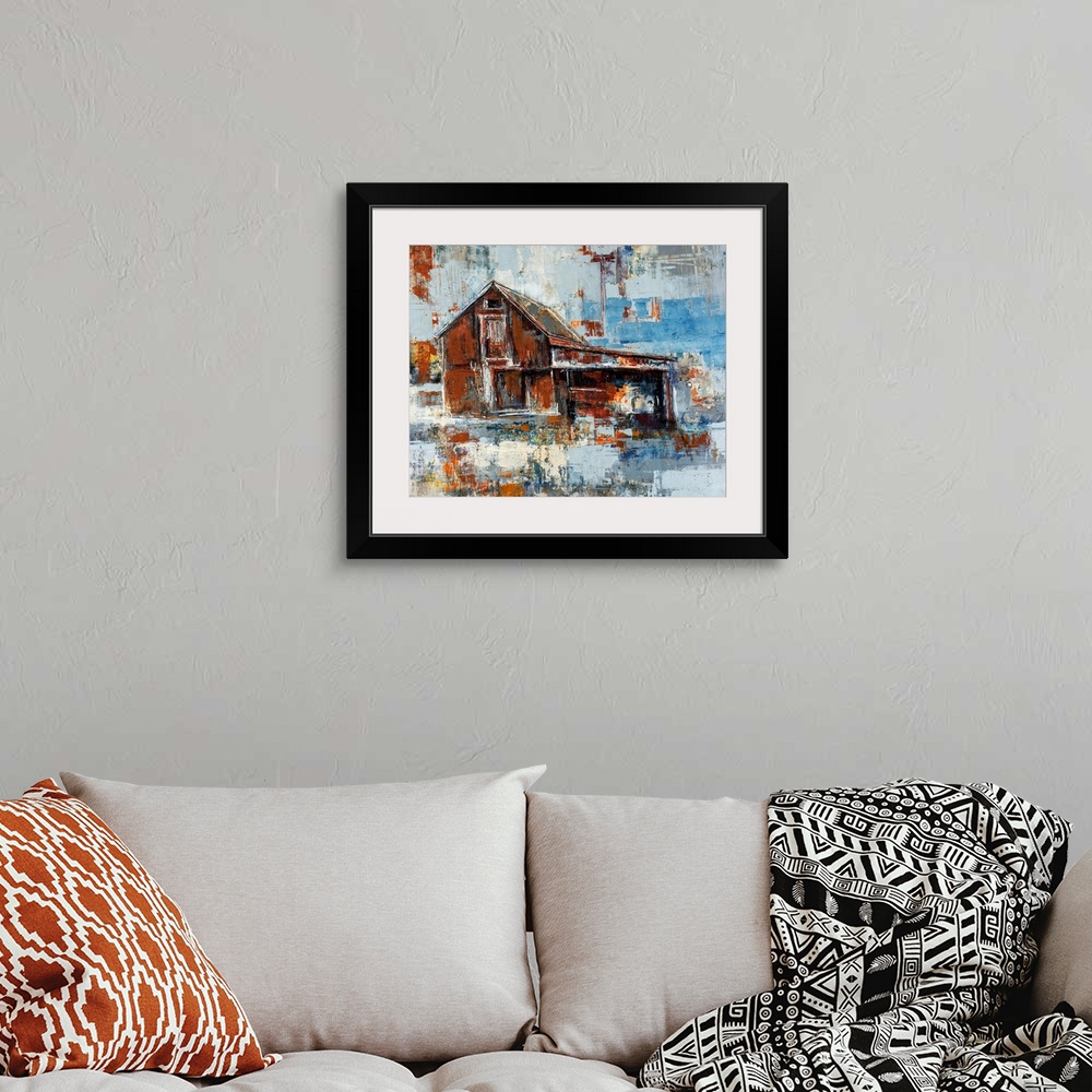 A bohemian room featuring Abstracted artwork of a barn painted with rust colored browns that contrast beautifully with cool...