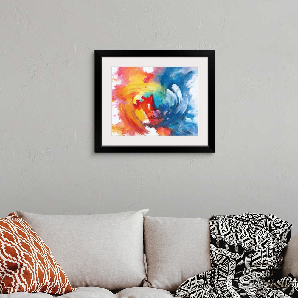 A bohemian room featuring Contemporary abstract painting in vivid rainbow colors, swirling in the center.