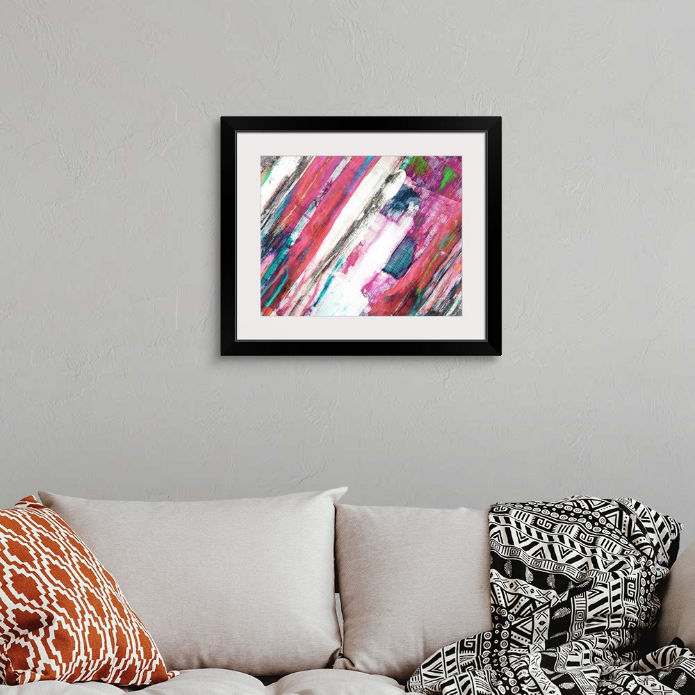 A bohemian room featuring Contemporary abstract of bold angled brush strokes in tones of pink, blue and gray.