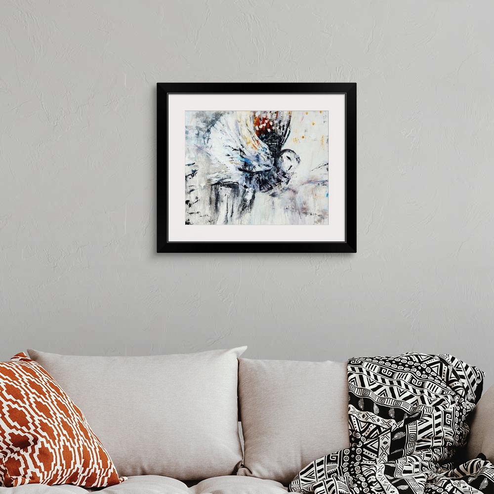 A bohemian room featuring Contemporary abstract painting of an owl in flight.