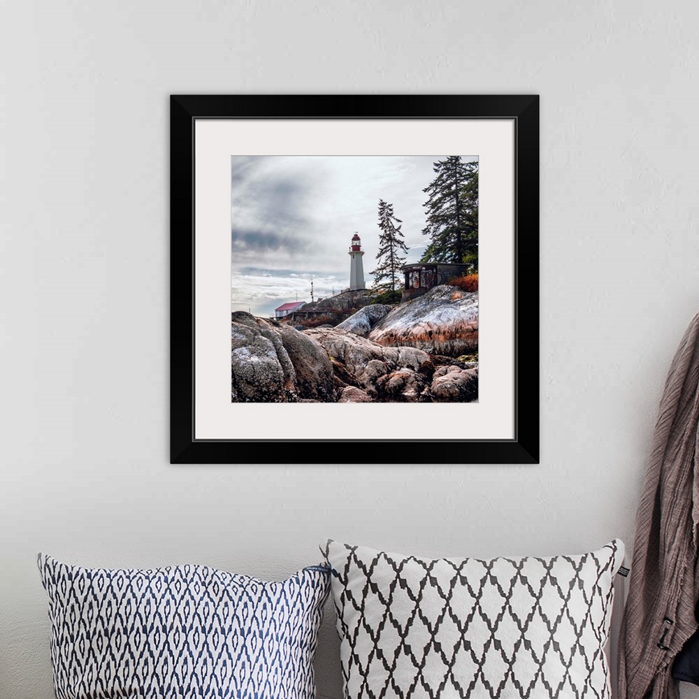 A bohemian room featuring View of Point Atkinson Lighthouse and rocky shore in Vancouver, British Columbia, Canada.