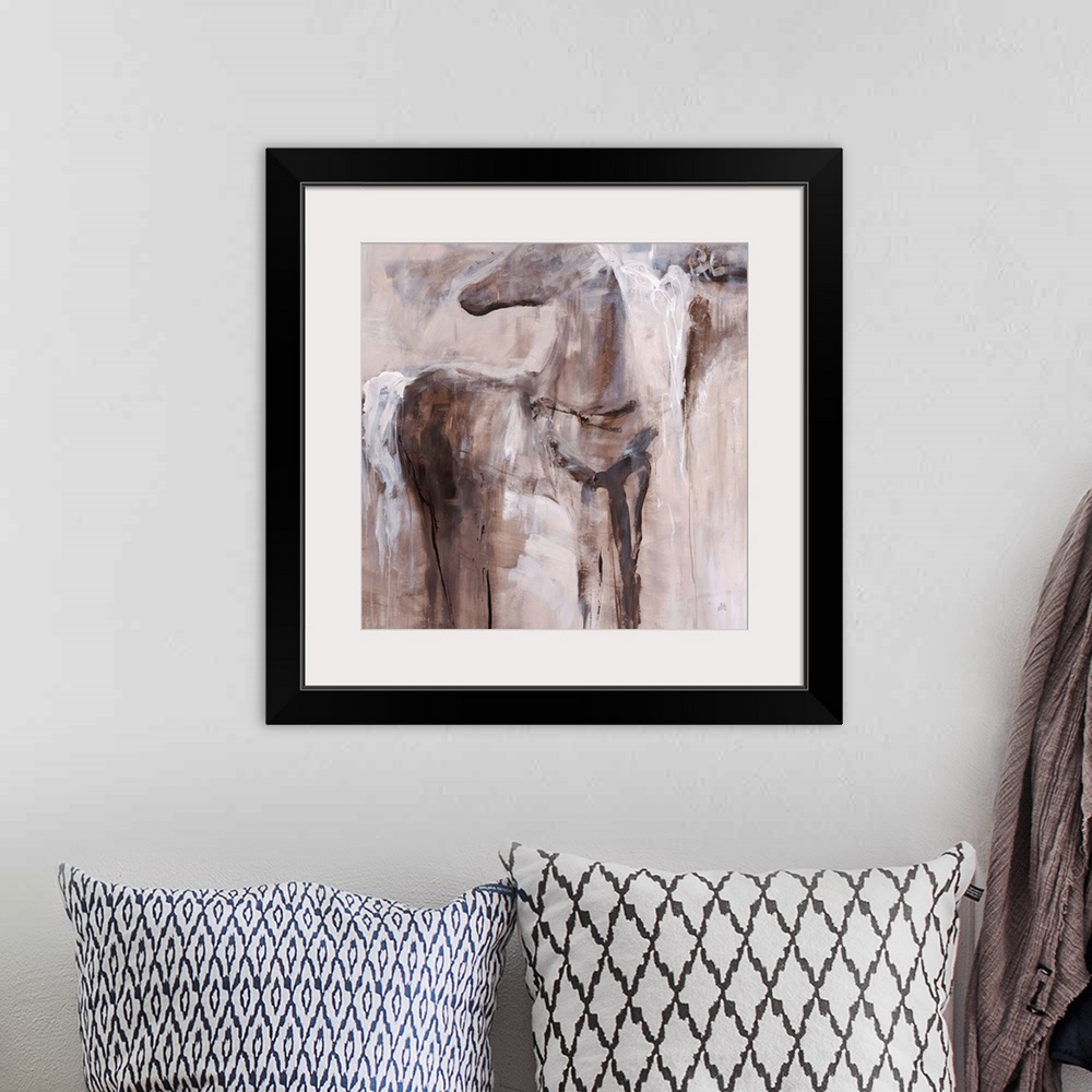 A bohemian room featuring Abstract painting of a figure of a horse fading into the background of earthy tones.