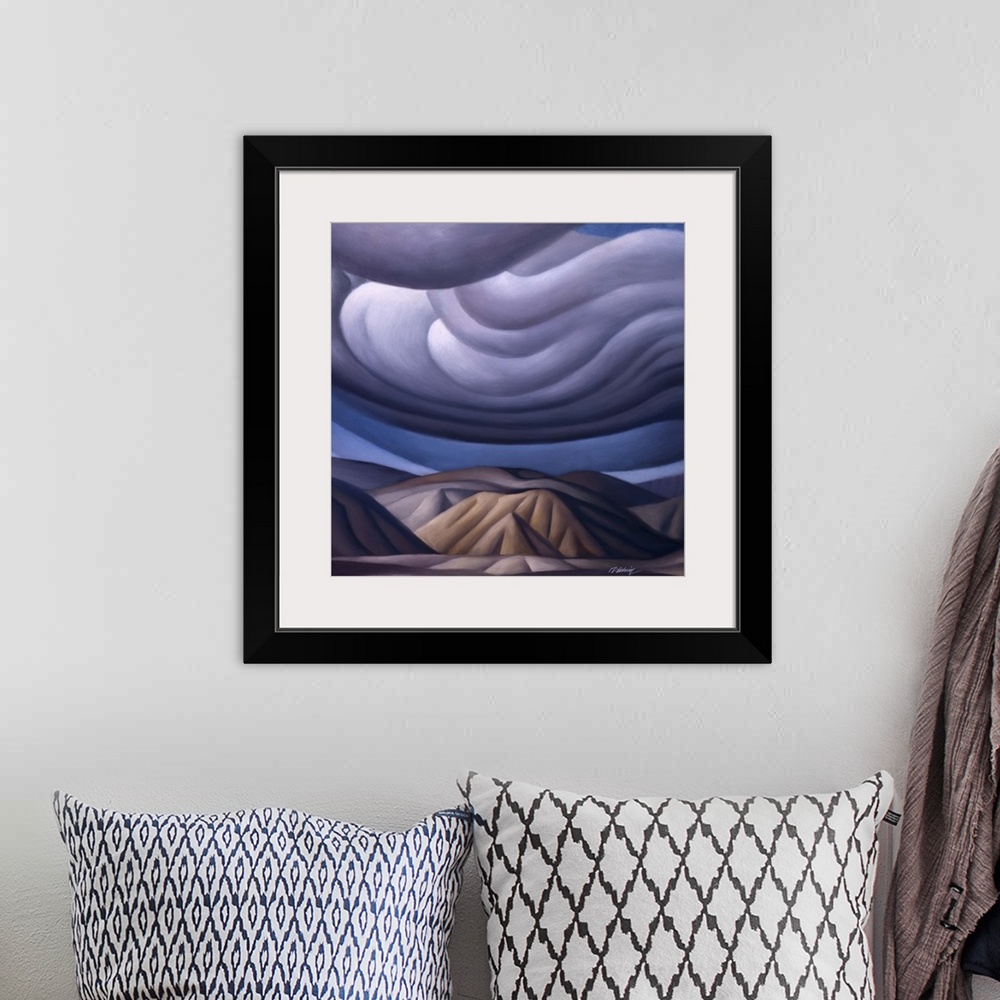 A bohemian room featuring Landscape painting of mountains and swirling clouds.