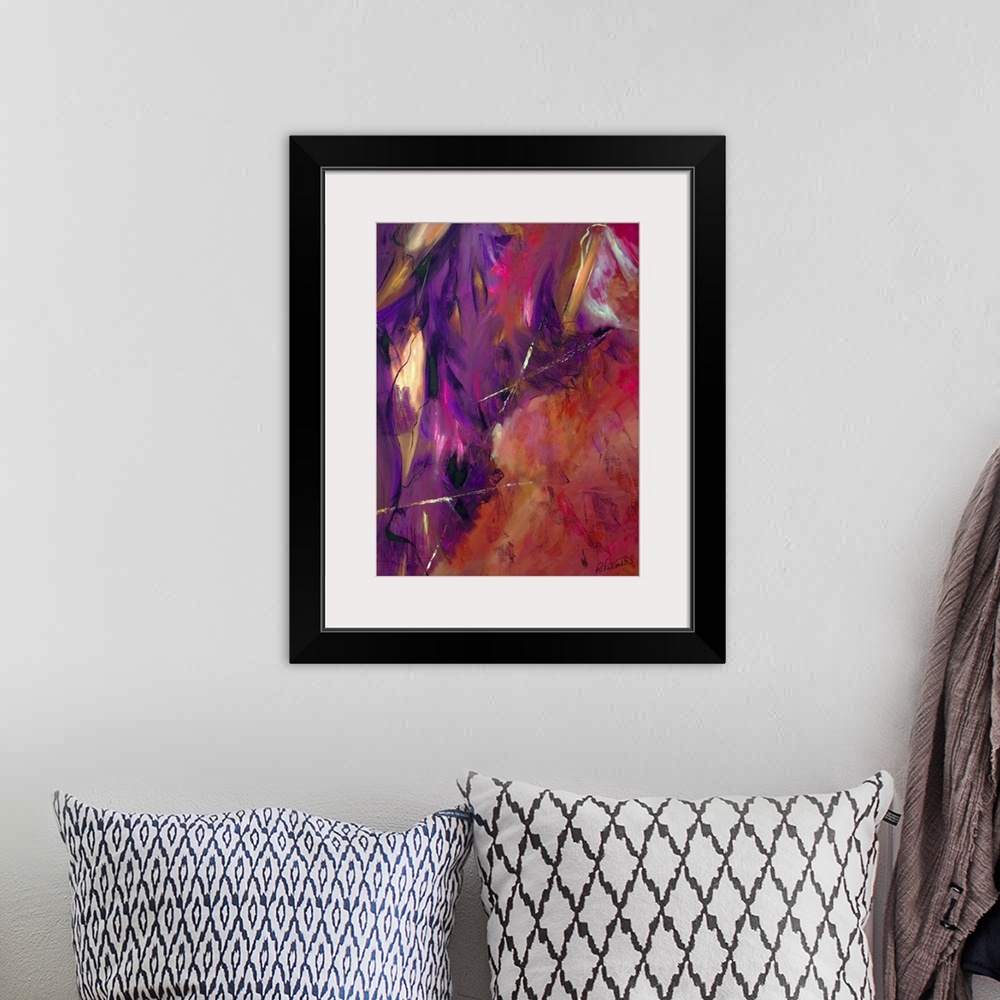 A bohemian room featuring Abstract painting using shades of red, pink, purple, black, and orange with small hints of bright...