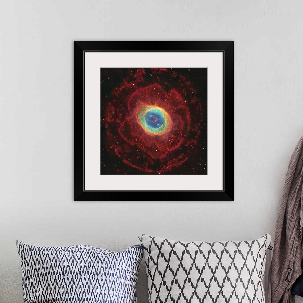 A bohemian room featuring M57, The Ring Nebula. The inner shell glows green from ionized oxygen and nitrogen while hydrogen...