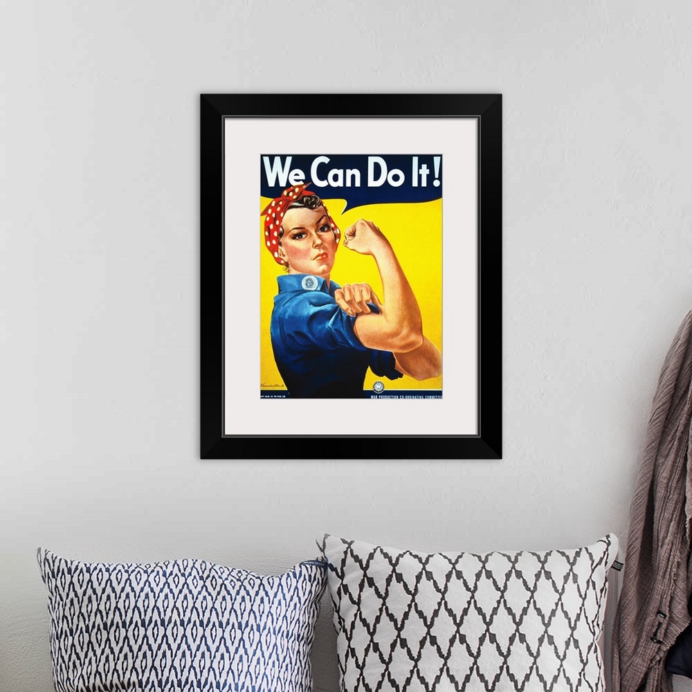 A bohemian room featuring Rosie The Riveter vintage war poster from World War II.