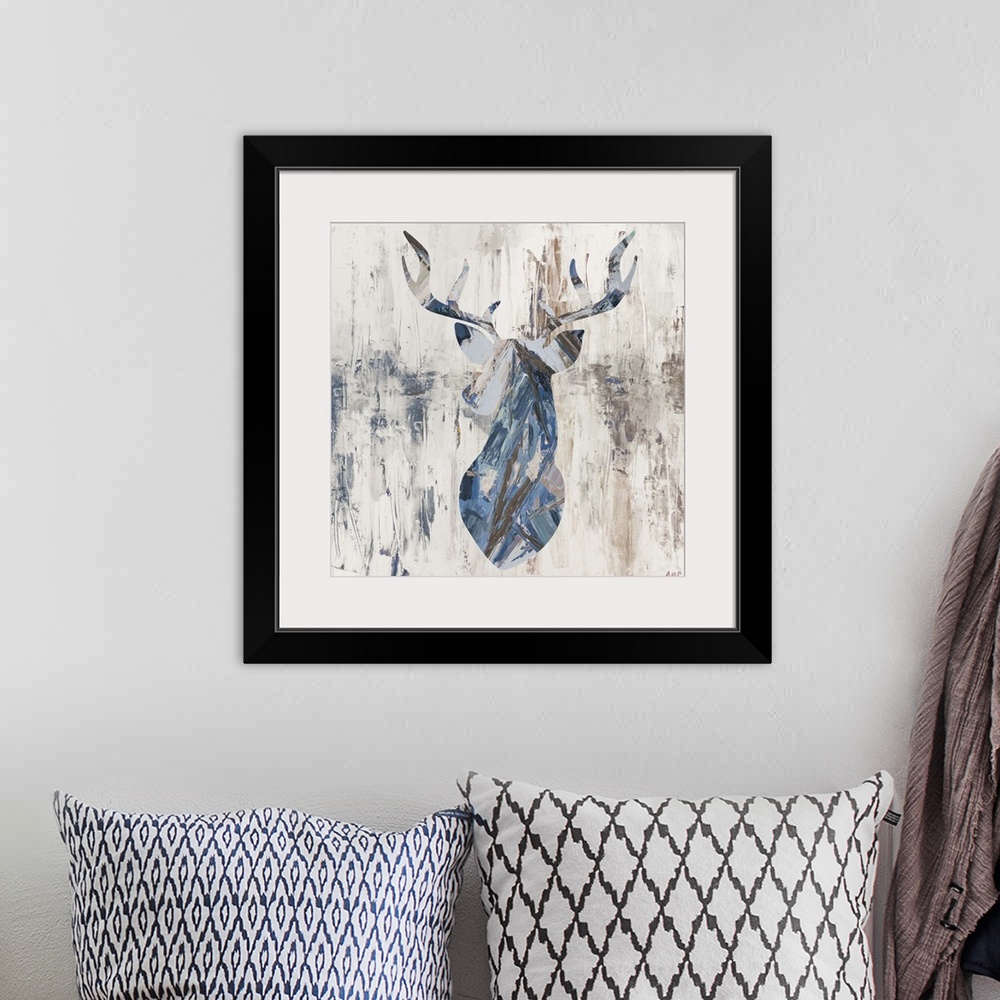 A bohemian room featuring Silhouette of a deer with large antlers in earth tones.