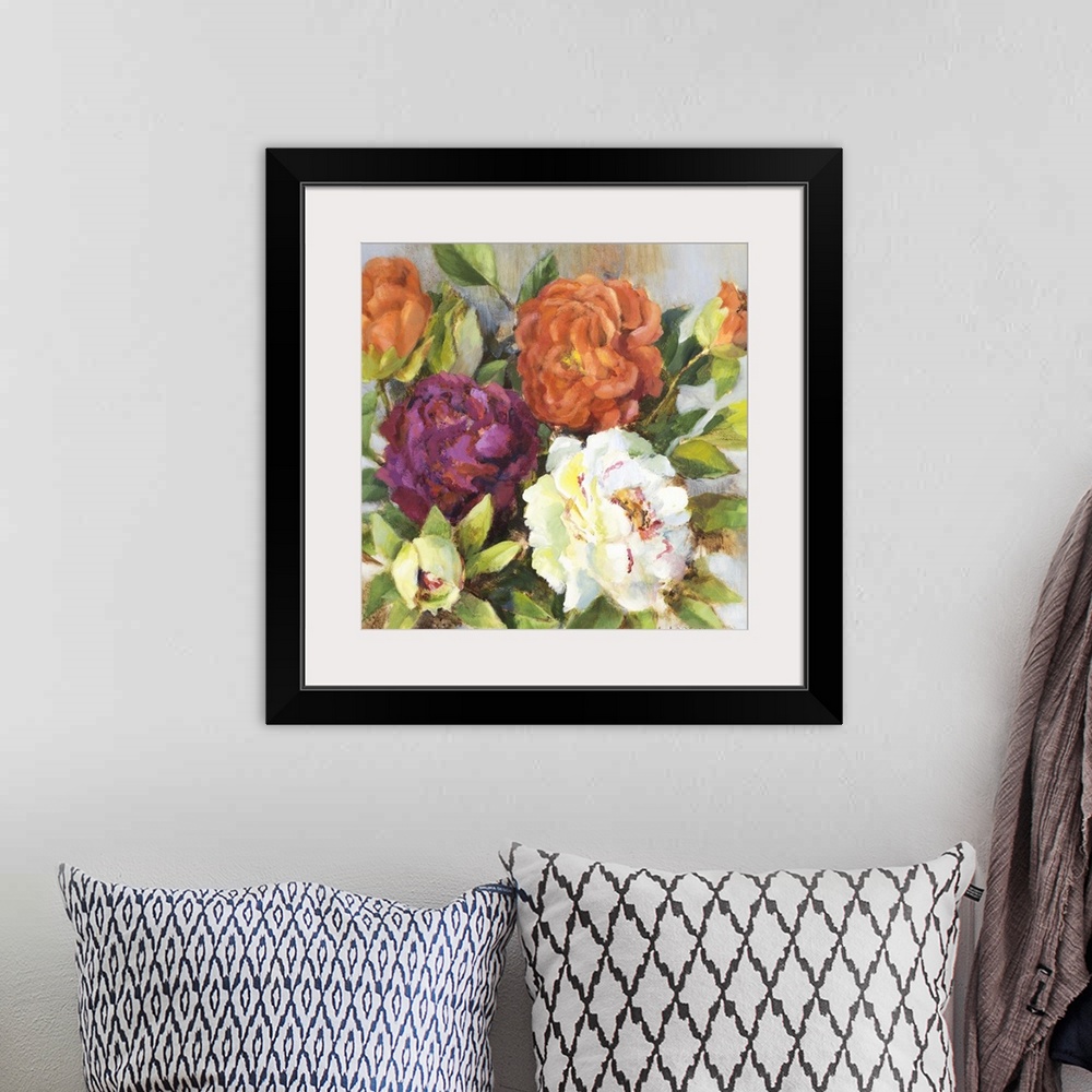 A bohemian room featuring Colorful painting of a bouquet of big beautiful flowers.