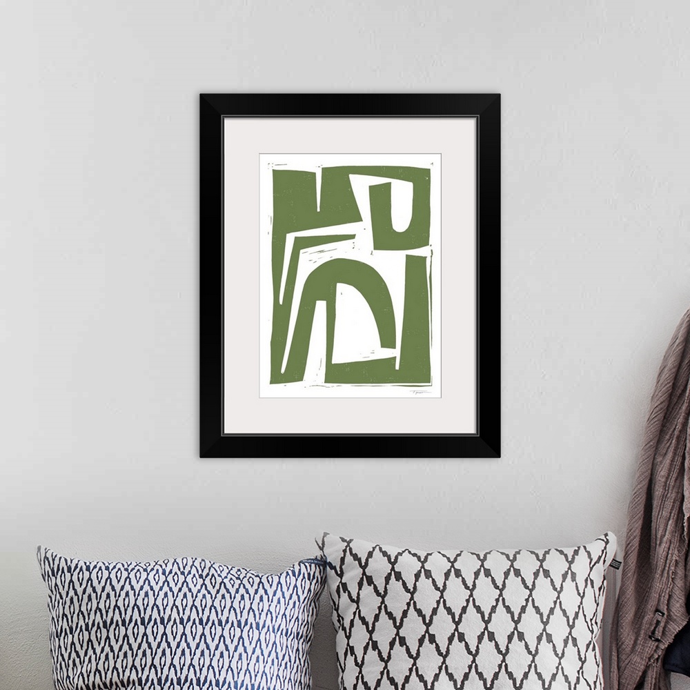 A bohemian room featuring Abstract tribal block print in the color army green.