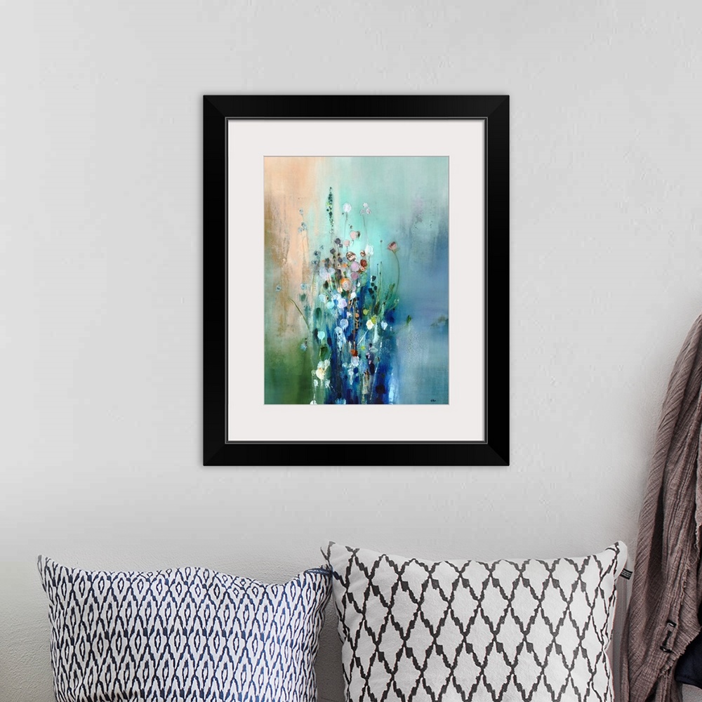 A bohemian room featuring A contemporary abstract painting that resembles a bunch of tall wildflowers on a green and blue b...