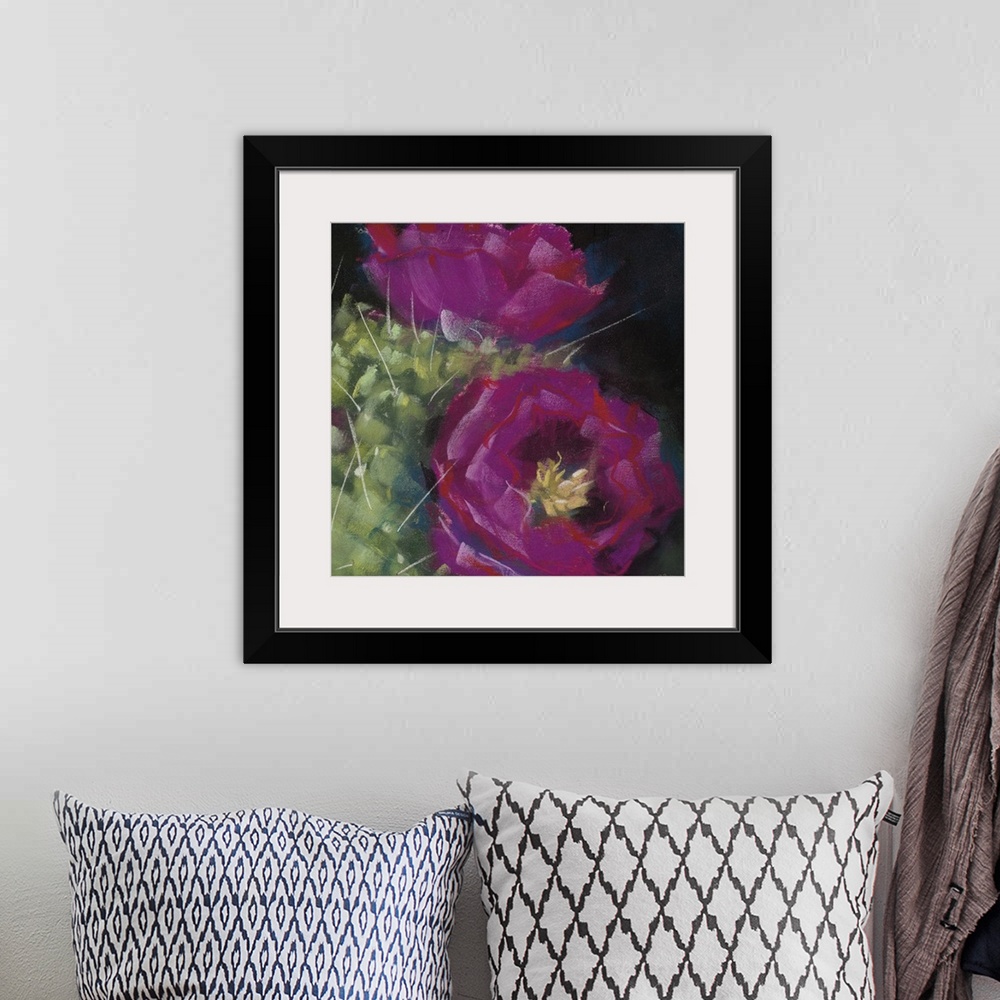A bohemian room featuring A square contemporary painting of purple blooms on a cactus with a black background.