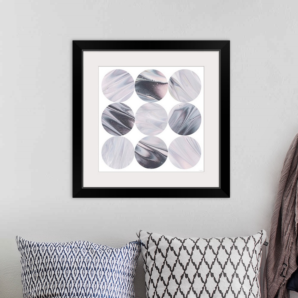 A bohemian room featuring Square geometric art of purple, blue, black, and pink marble designed circles stacked in rows on ...