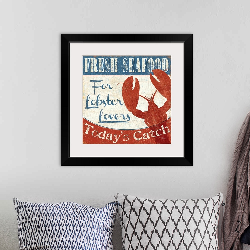 A bohemian room featuring Weathered sign for a fish market, with a large red lobster silhouette.