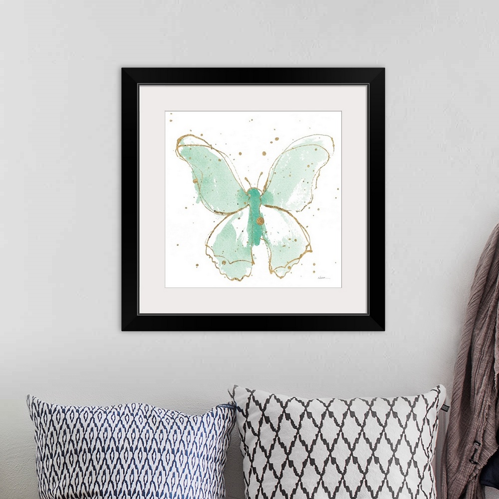 A bohemian room featuring A square watercolor painting of a mint green butterfly outlined in gold with gold splatters.