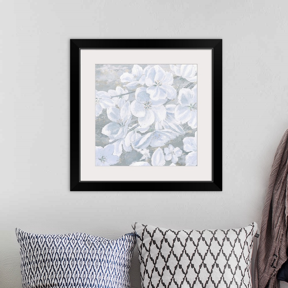 A bohemian room featuring Square painting of cool toned white flowers on a slate blue and grey background.