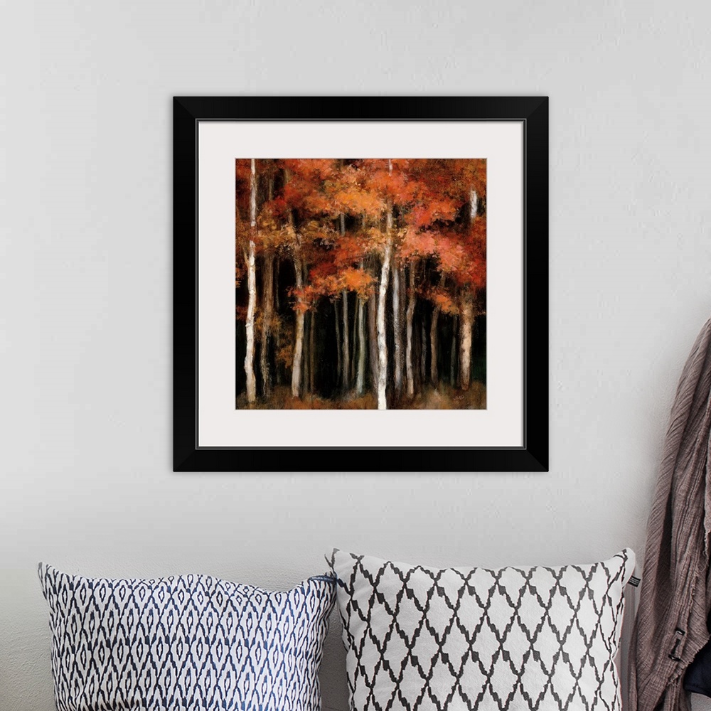 A bohemian room featuring Square contemporary painting of dark woods filled with orange and yellow Autumn trees.