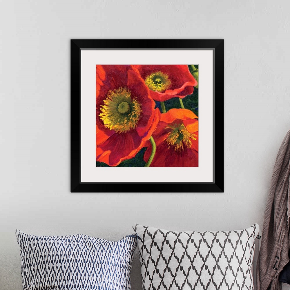 A bohemian room featuring Painting of three poppy flowers up close in the sun.
