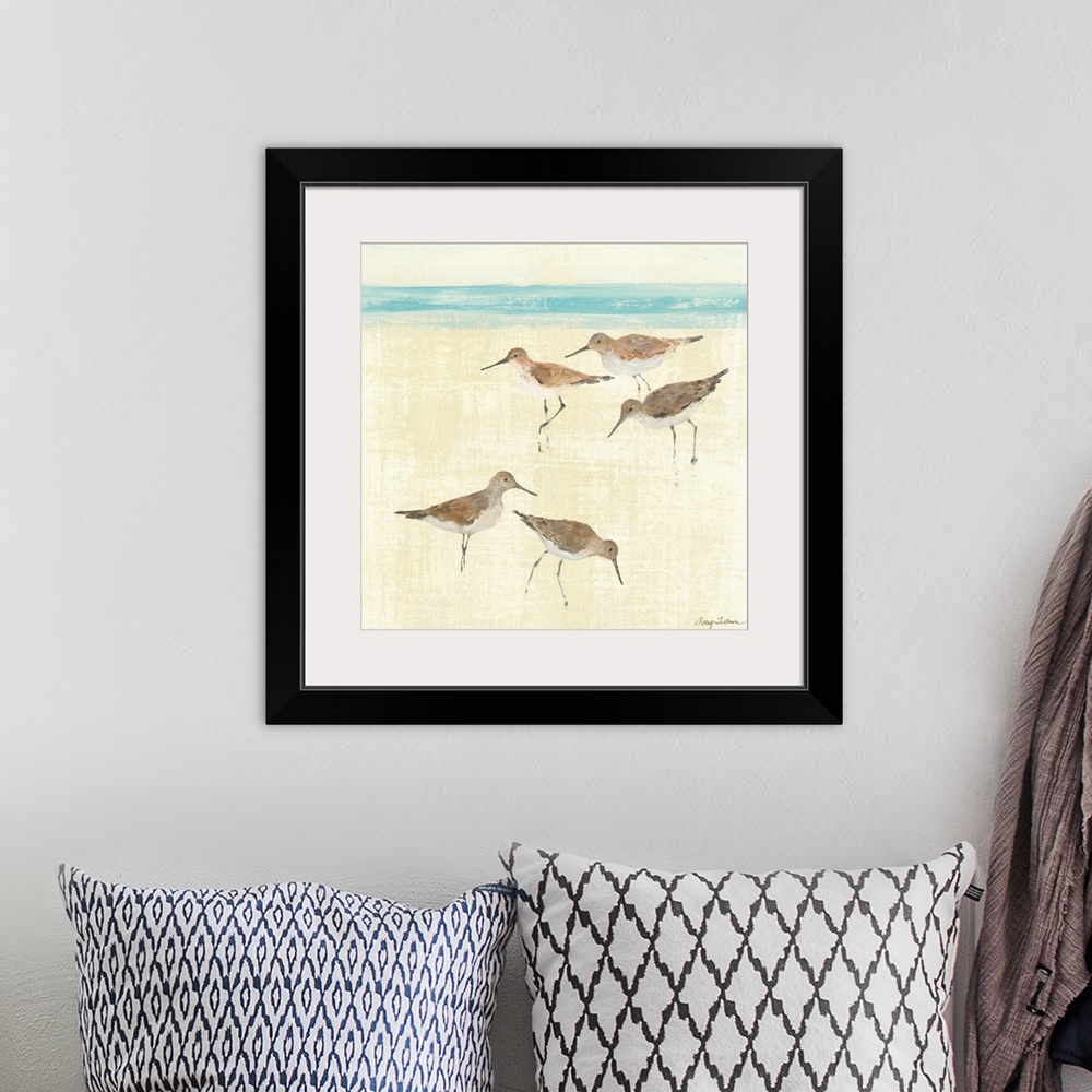 A bohemian room featuring Square painting of ocean birds walking on the sand of a beach with the sea in the distance.