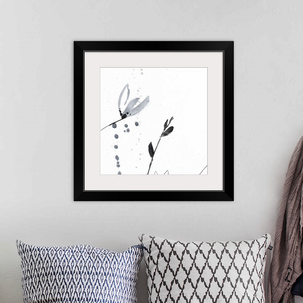 A bohemian room featuring Square watercolor abstract of small gray flowers with overlapping spatters of paint on a white ba...