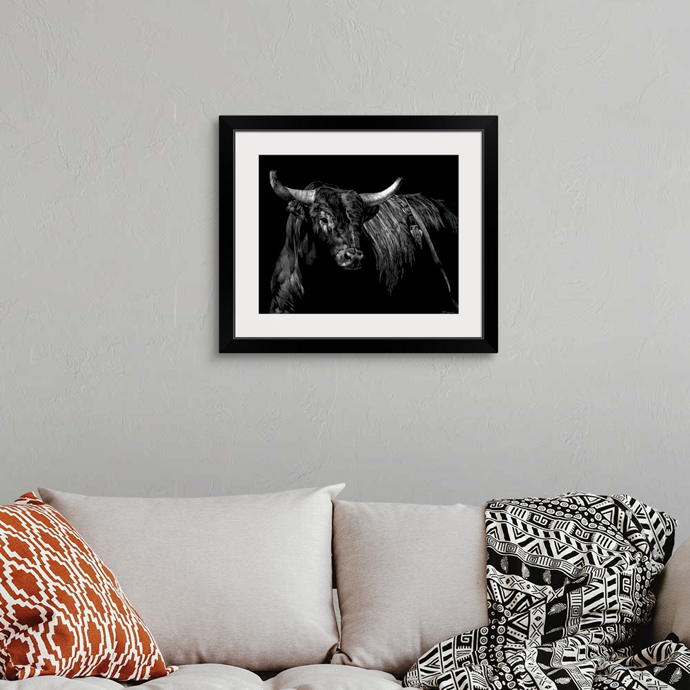 A bohemian room featuring Horizontal artwork on a big wall hanging of a sketched brindle rodeo bull, looking forward, on a ...