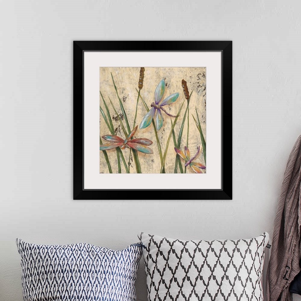 A bohemian room featuring A transitional image of three jewel-toned dragonflies hovering among cattail grasses. This artwor...