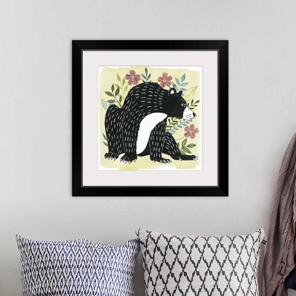 A bohemian room featuring A square decorative design of a black and white bear surrounded by flowers on a pale yellow backg...