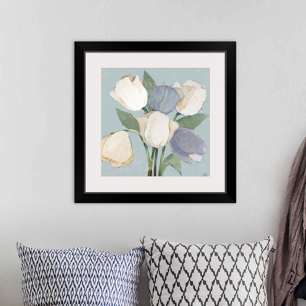 A bohemian room featuring Square painting of white and light purple French tulips on a pale blue background.