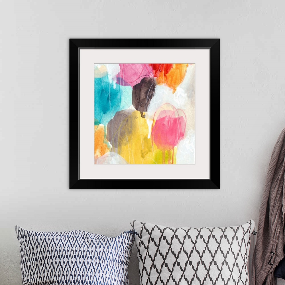 A bohemian room featuring Colorful contemporary abstract artwork using globular shapes overlapping one another.