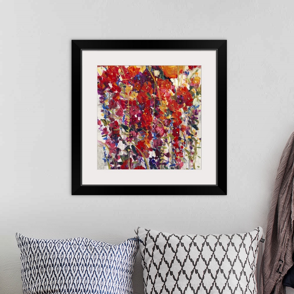 A bohemian room featuring Colorful contemporary painting of a vibrant flowers.