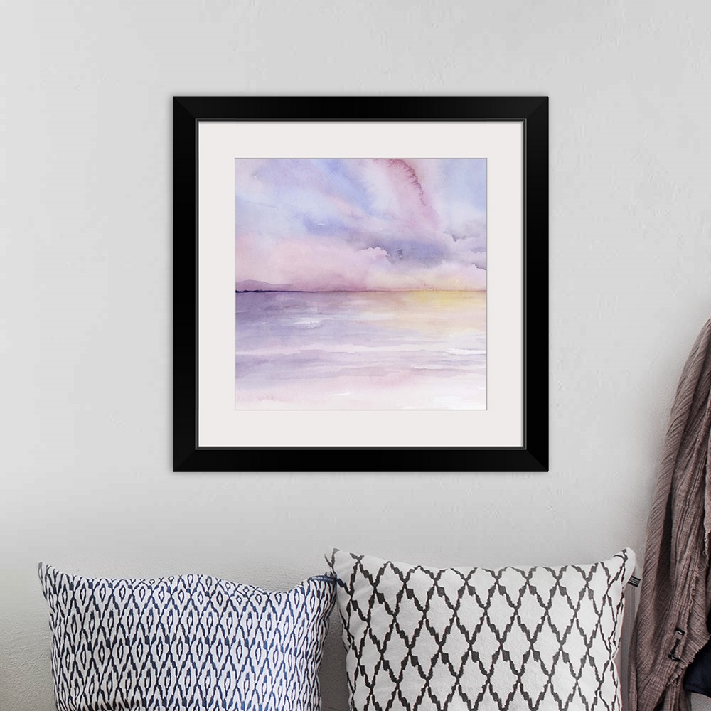 A bohemian room featuring Abstract landscape of a sun setting on the sea in pastel colors.
