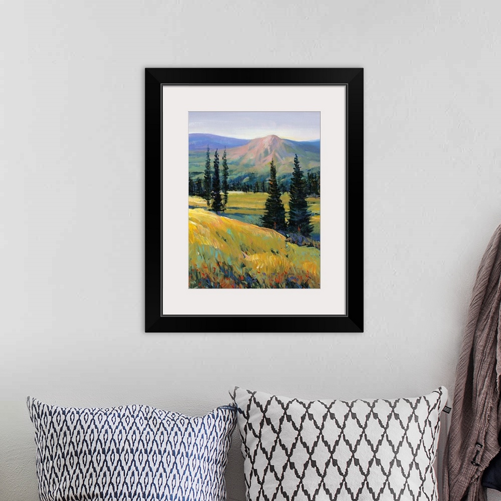A bohemian room featuring Contemporary painting of a mountain valley landscape with a small river and pine trees.