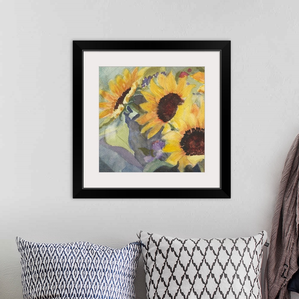 A bohemian room featuring Square watercolor painting of large sunflower blooms.