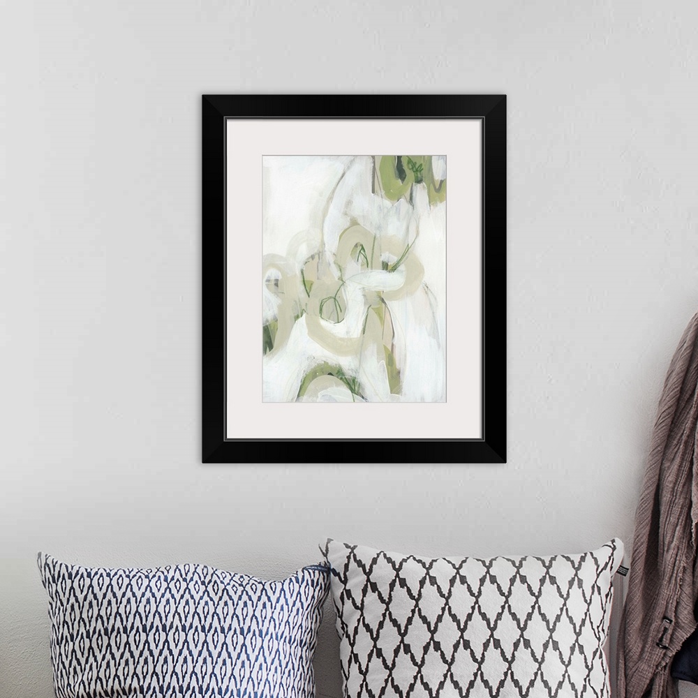 A bohemian room featuring This abstract artwork features expressive brush strokes in khaki, green and white to create drama...